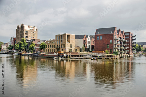 Zwolle, The Netherlands, August 20, 2021: overal view of the reently built Kraanbolwerk housing development on the ramparts of the old town photo