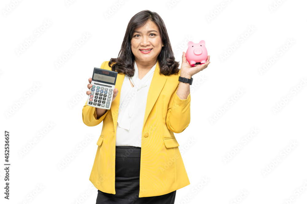 Business asian lady people in yellow suit holding calculator and piggy bank isolated on white background; finance economy banking saving concept. Business asian lady people in yellow suit holding calculator and piggy bank isolated on white background; finance economy banking saving concept.
