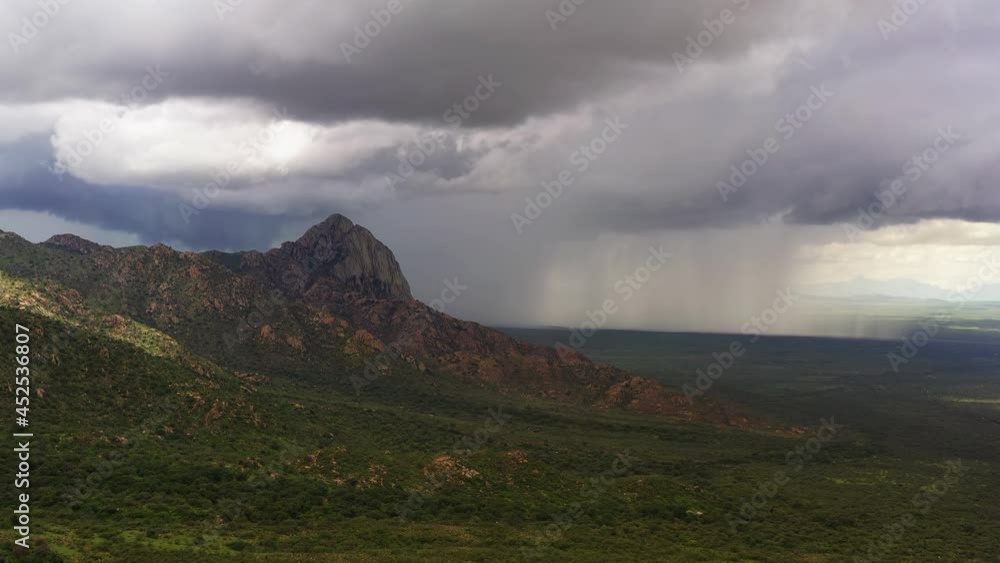 Monsoon rain behind elephant head with lightening, Madera Canyon, Arizona. Aerial backwards Monsoon rain behind elephant head with lightening, Madera Canyon, Arizona. Aerial backwards