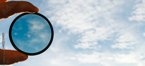 cpl polarization filter for photo video cameras background of the sky banner