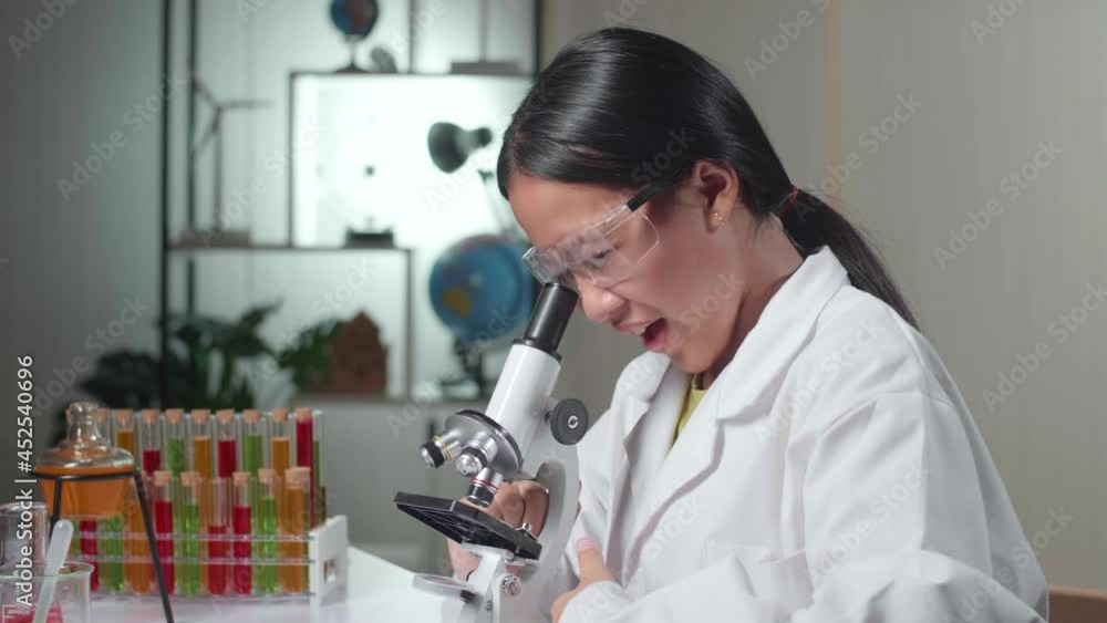 Excited Young Asian Scientist Girl Looking At Microscope And Say Wow
Excited Young Asian Scientist Girl Looking At Microscope And Say Wow