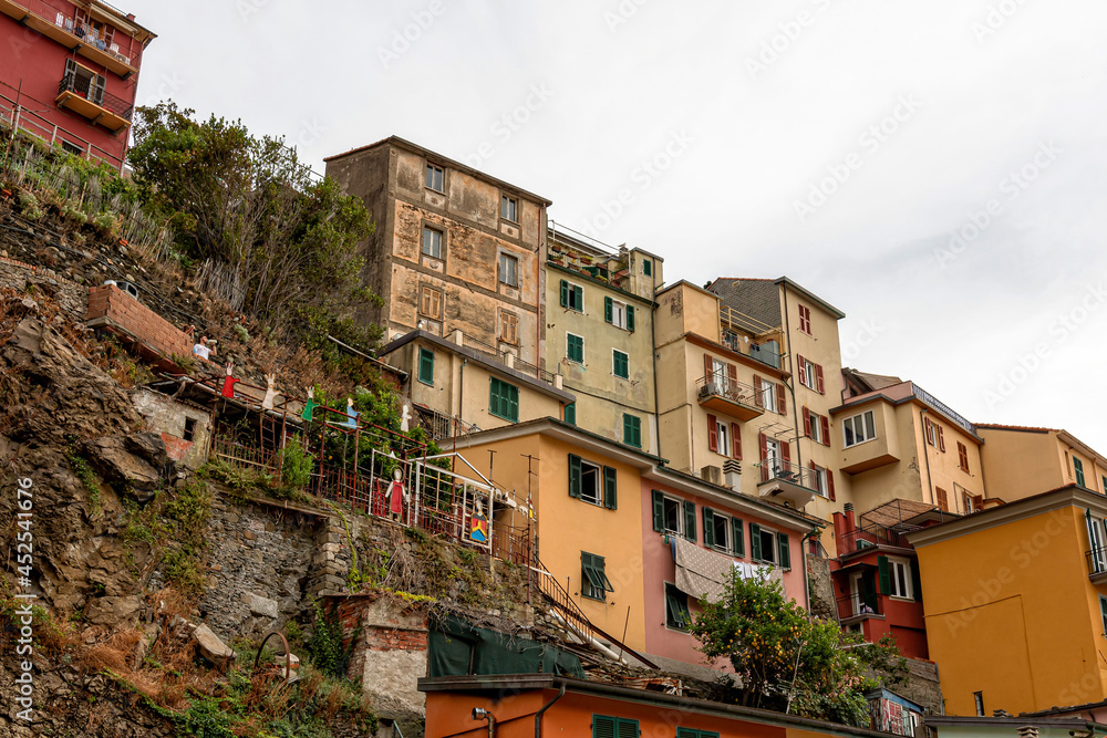 scenic view of colorful village Manarola and ocean coast in Cinque Terre, Italy