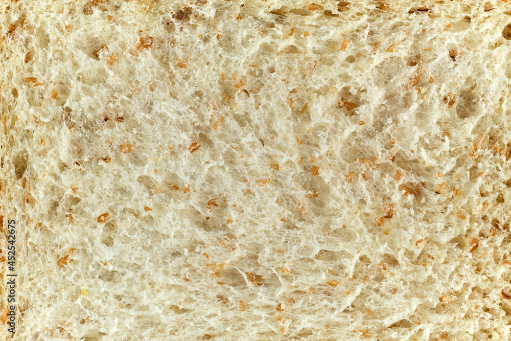 close up shot of a surface texture of sliced whole wheat sandwich bread for food background wallpaper