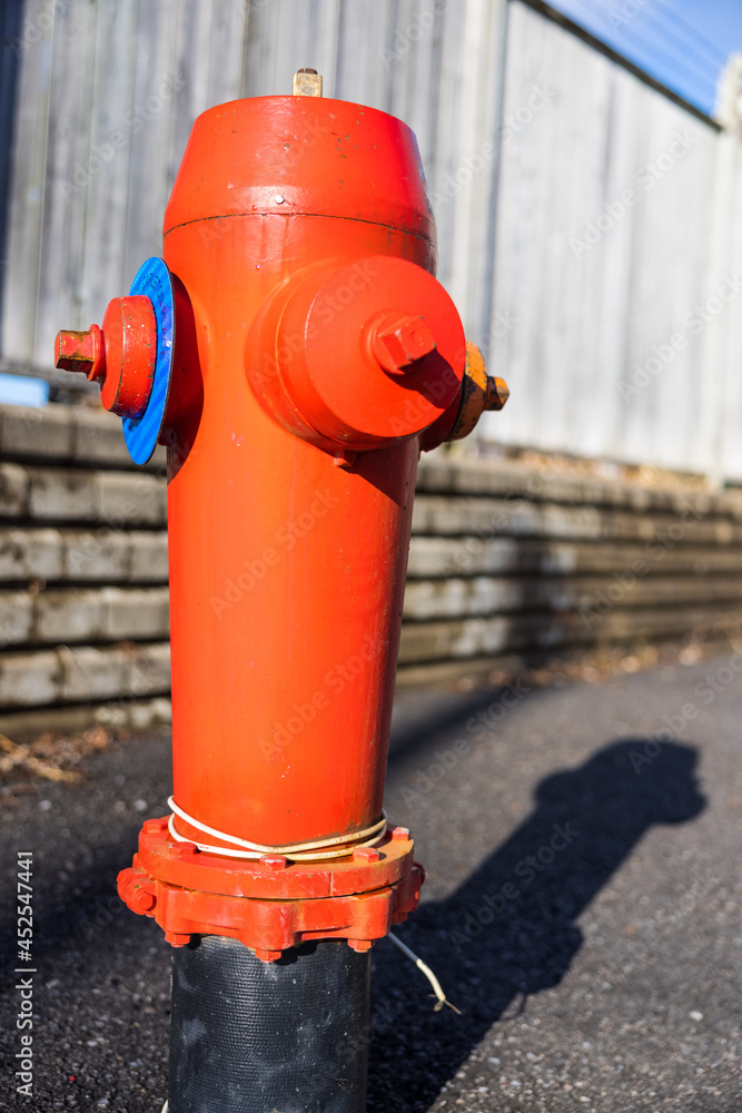 Bright Red Fire Hydrant on Roadside Bright Red Fire Hydrant on Roadside