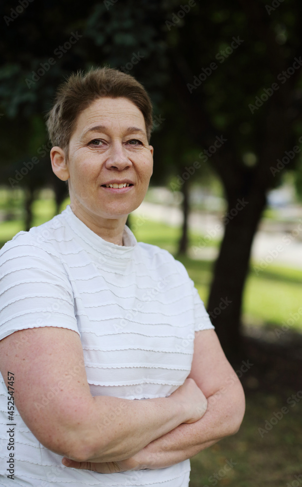 Outdoor portrait of 50 years old woman Outdoor portrait of 50 years old woman