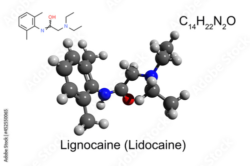 Chemical formula, skeletal formula and 3D ball-and-stick model of lignocaine (lidocaine), a local anesthetic of the amino amide type, white background photo