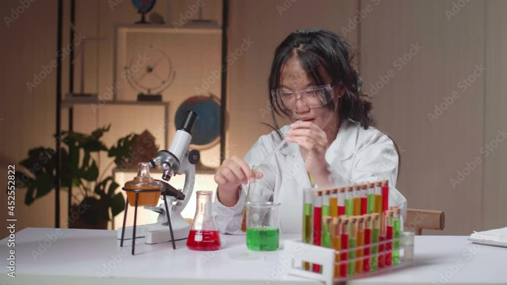Excited Young Asian Scientist Girl With Dirty Face Mixes Chemicals In Test Tube. Child Learn With Interest
Excited Young Asian Scientist Girl With Dirty Face Mixes Chemicals In Test Tube. Child Learn With Interest