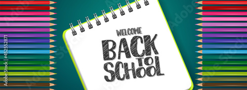 School banner or header. Coloring pencils on blue background with lettering. Realistic 3d vector illustration.