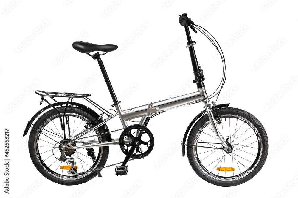 Folding bike in silver color on a white background