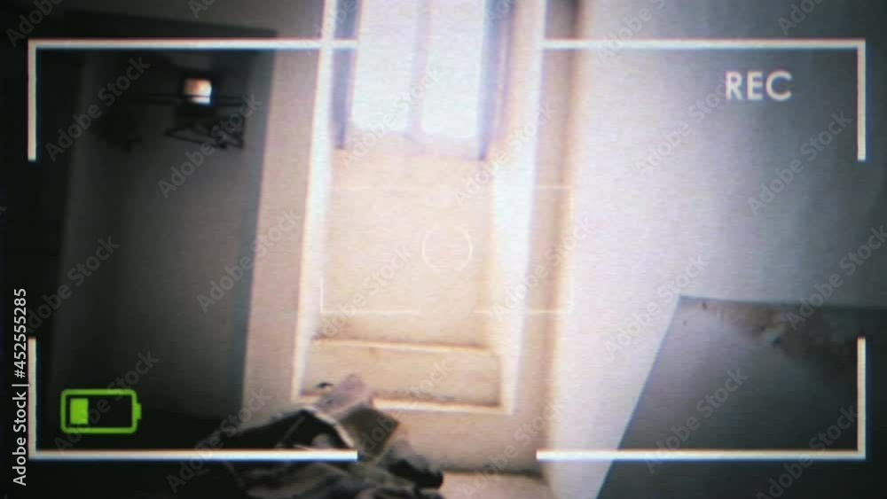 Intentional VHS tape distortion: recording while exploring the dirty rooms of an abandoned house (camera viewfinder). Scary horror Halloween feeling.
Intentional VHS tape distortion: recording while exploring the dirty rooms of an abandoned house (camera viewfinder). Scary horror Halloween feeling.