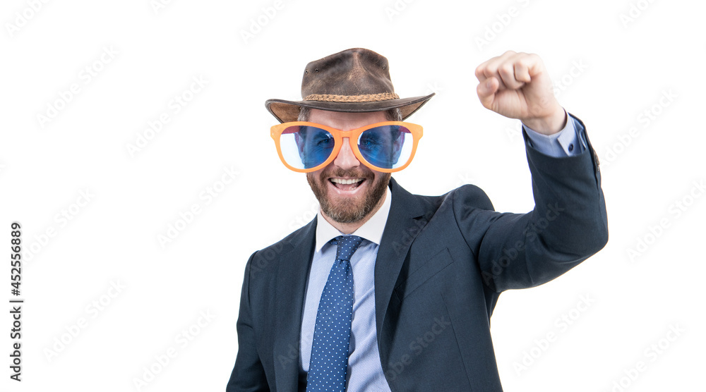 Happy man wear party glasses and cowboy hat in formalwear make winner gesture, celebration Happy man wear party glasses and cowboy hat in formalwear make winner gesture, celebration