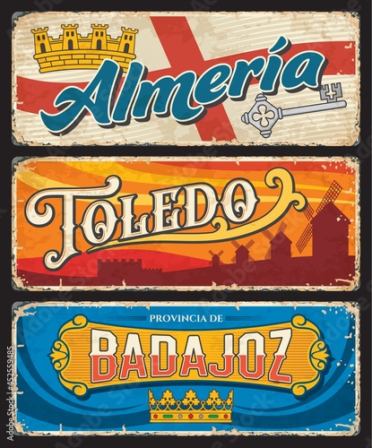 Almeria, Toledo and Badajoz Spanish provinces tin signs. Spain regions grunge plates with territory flags, coat or arms crown and key symbol and landmarks. European voyage, travel to Spain memory sign photo