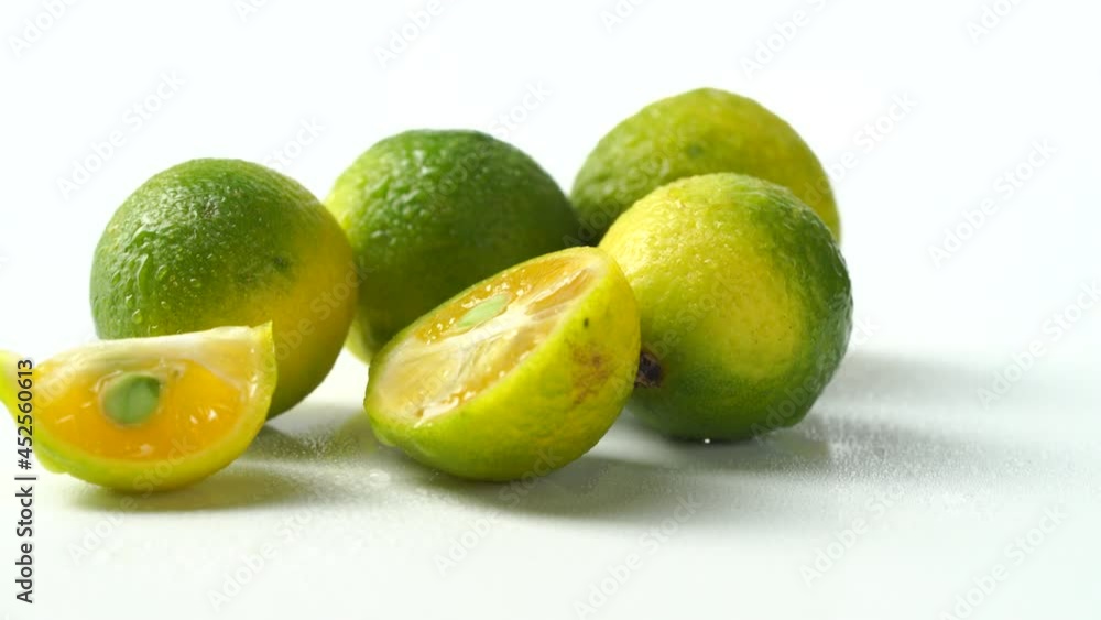 Fresh little limes on pure white background Fresh little limes on pure white background