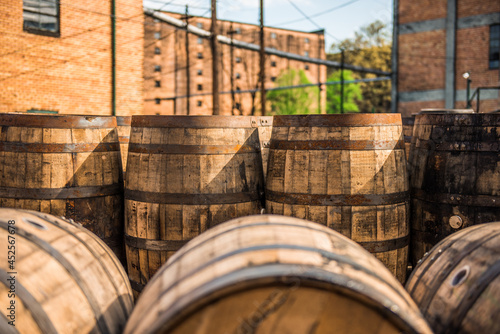 Fototapet Rustic wooden barrels for bourbon whiskey.
