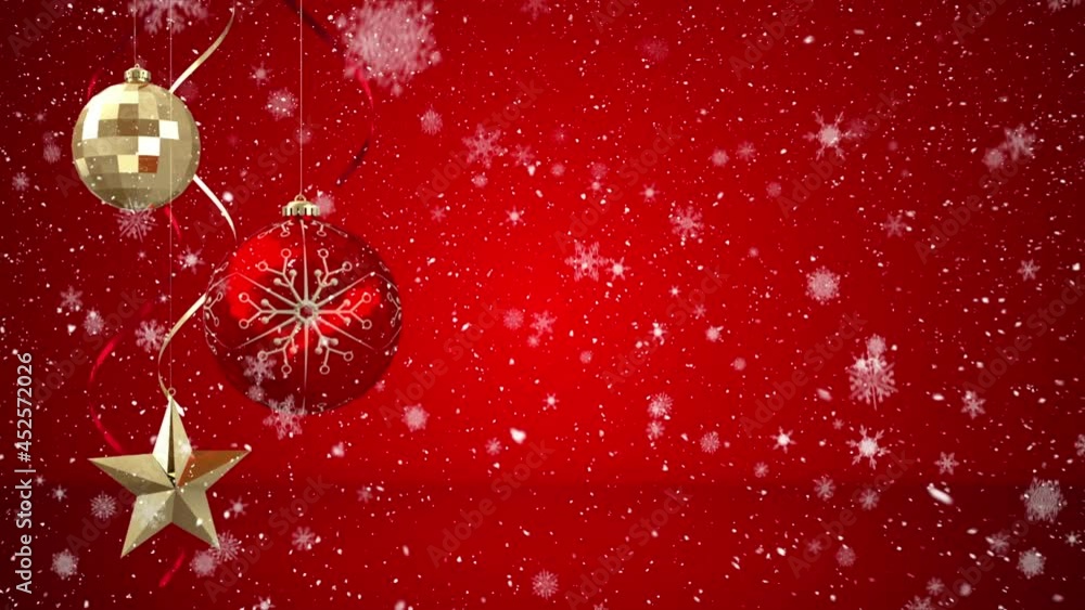 Animation of snow falling over red and gold christmas baubles decoration Animation of snow falling over red and gold christmas baubles decoration
