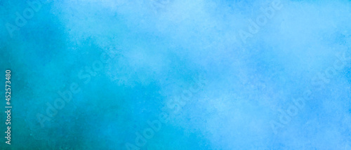 Watercolor background in blue and white painting with gradient painted texture and grunge in abstract design, pastel blue green backgrounds or paper banner of old vintage parchment paper