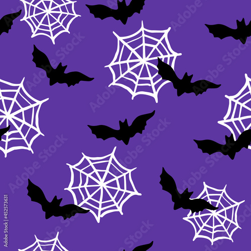 All over Halloween seamless vector repeat pattern with black bat and spiderweb silhouettes on dark purple background