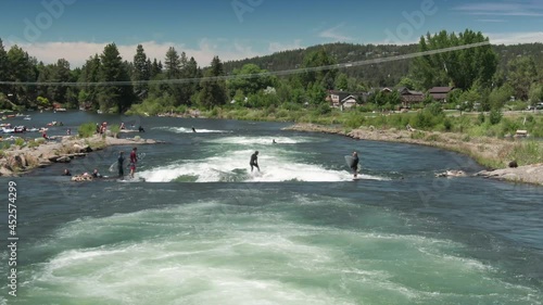 Aerial: People surfing on the Deschutes River at the Bend Whitewater Park, Bend, Oregon photo