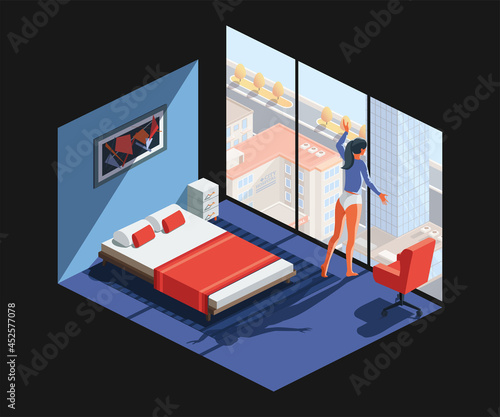 Bedroom with girl looking out of window in earl morning