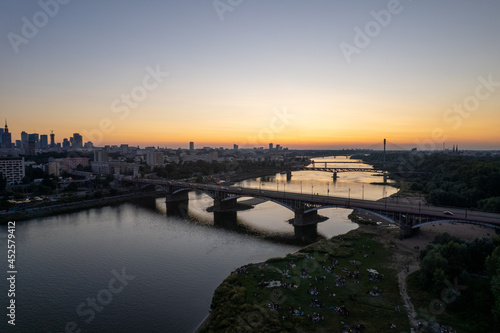 Wallpaper Mural wieżowce w cetrum Warszawy, rzeka Wisła, plaża o zachodzie słońca z lotu ptaka, dron Torontodigital.ca