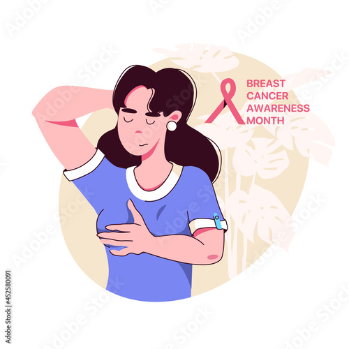 Young woman palpates her breasts, breast cancer self-diagnosis. Breast Cancer Awareness Month.