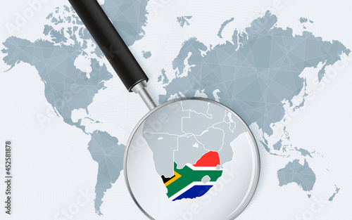 World map with a magnifying glass pointing at South Africa. Map of South Africa with the flag in the loop.