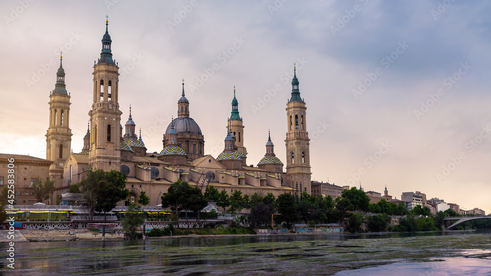 Cathedral Basilica of Our Lady of Pillar and Ebro river at sunset of Zaragoza