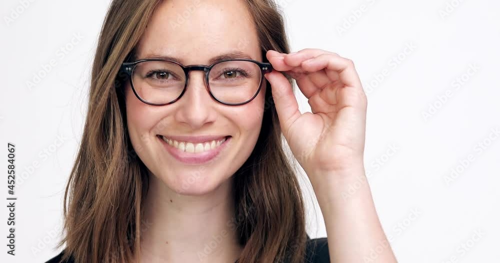 Portrait of a beautiful and succesful businesswoman with glasses and brown hair smiling and laughing. High quality 4K footage Portrait of a beautiful and succesful businesswoman with glasses and brown hair smiling and laughing. High quality 4K footage