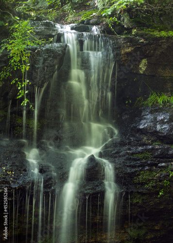 Silky water of Blackledge Falls in Glastonbury  Connecticut in summertime