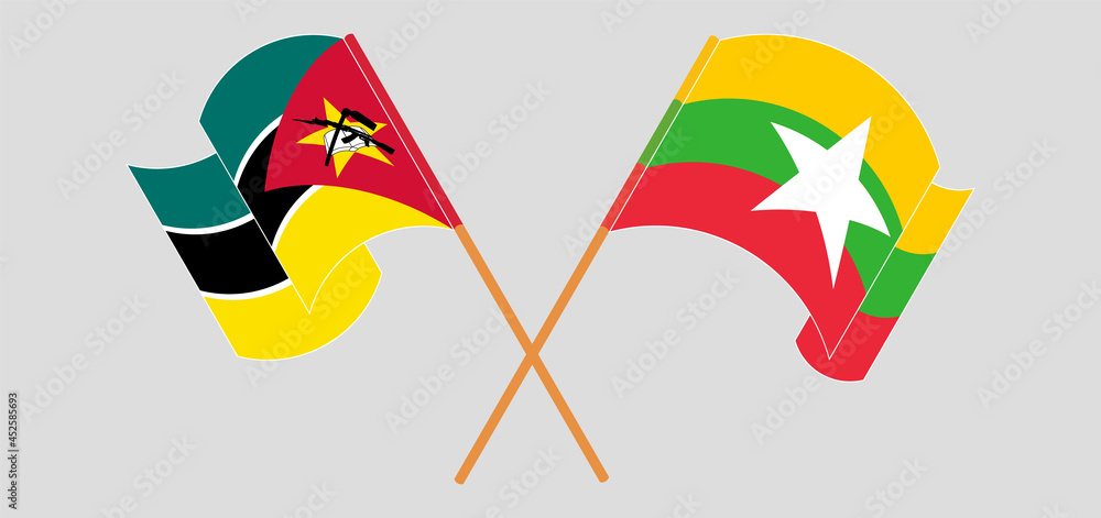 Crossed and waving flags of Mozambique and Myanmar Crossed and waving flags of Mozambique and Myanmar