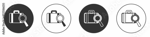 Black Airline service of finding lost baggage icon isolated on white background. Search luggage. Circle button. Vector