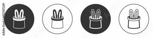 Black Magician hat and rabbit ears icon isolated on white background. Magic trick. Mystery entertainment concept. Circle button. Vector