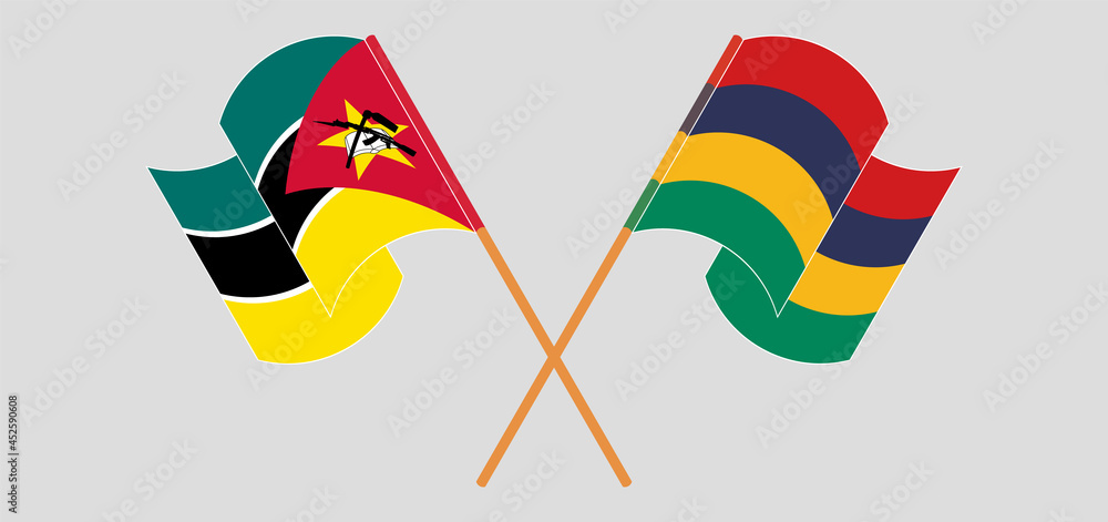 Crossed and waving flags of Mozambique and Mauritius Crossed and waving flags of Mozambique and Mauritius