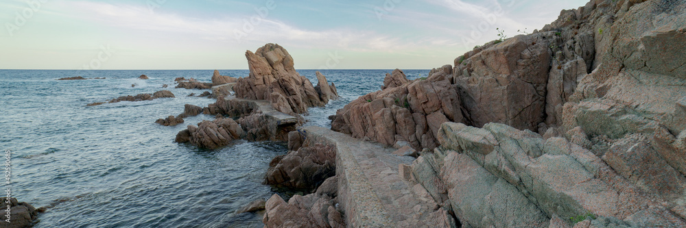 Panoramic view of the runway known as the bridges way in Canyet Creek between rocks and the mediterranean sea Panoramic view of the runway known as the bridges way in Canyet Creek between rocks and the mediterranean sea