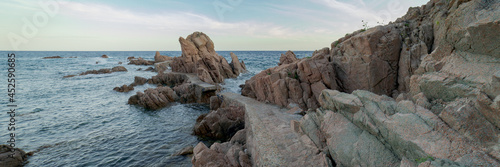 Panoramic view of the runway known as the bridges way in Canyet Creek between rocks and the mediterranean sea photo