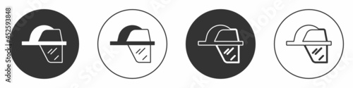 Black Firefighter helmet or fireman hat icon isolated on white background. Circle button. Vector