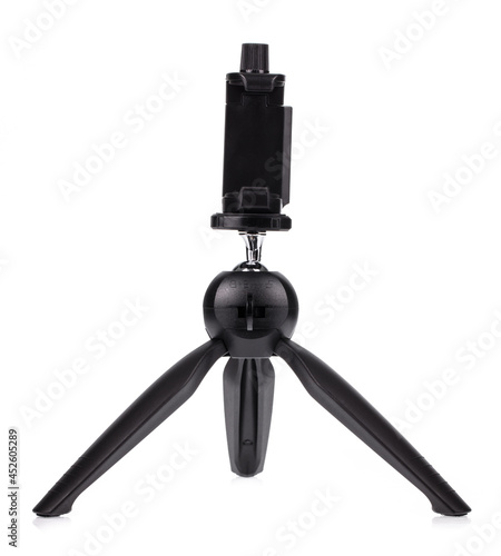 Mini clamp tripod for smartphones cameras isolated on a white background.