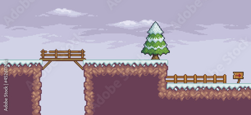 Pixel art game scene in snow with pine trees, bridge, fence, clouds and 8bit background