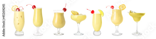 Set of tasty banana daiquiri cocktails on white background