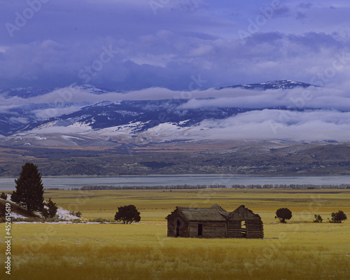 landscape with a barn in the background