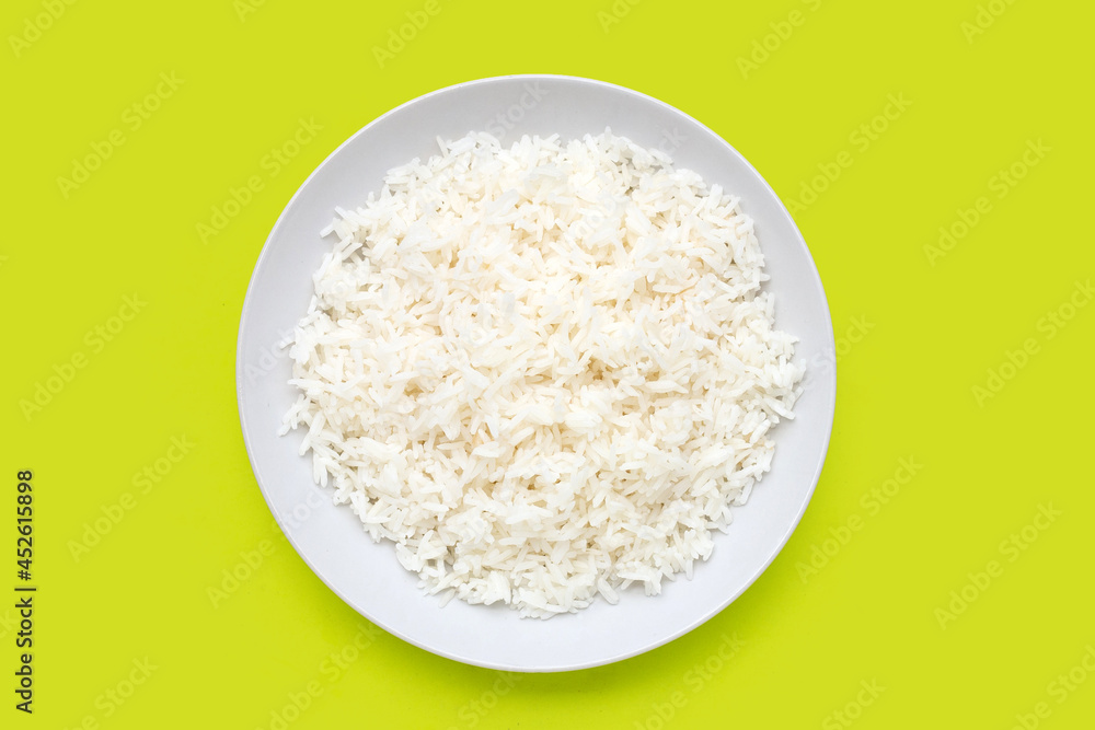 Dish of rice on green background. Dish of rice on green background.