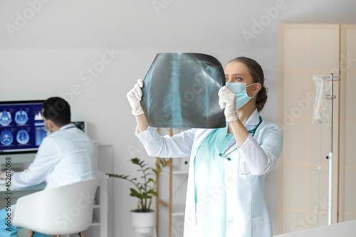 Female doctor with x-ray sc...