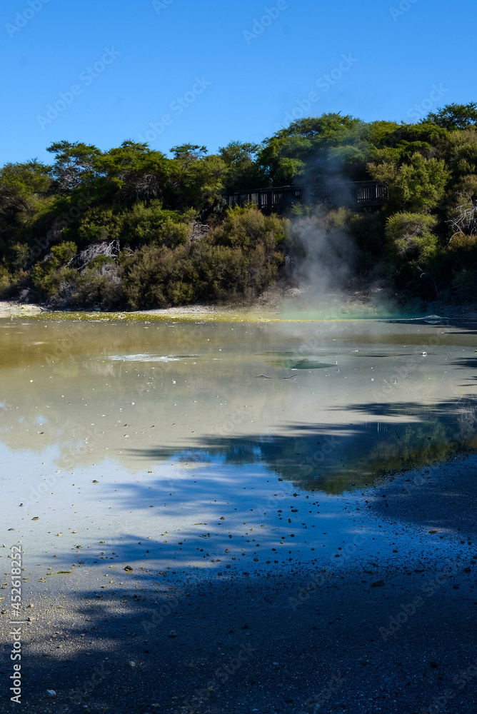 Geothermal Landscape with hot boiling mud and sulphur springs due to volcanic activity in Wai-O-Tapu, Thermal Wonderland New Zealand Geothermal Landscape with hot boiling mud and sulphur springs due to volcanic activity in Wai-O-Tapu, Thermal Wonderland New Zealand