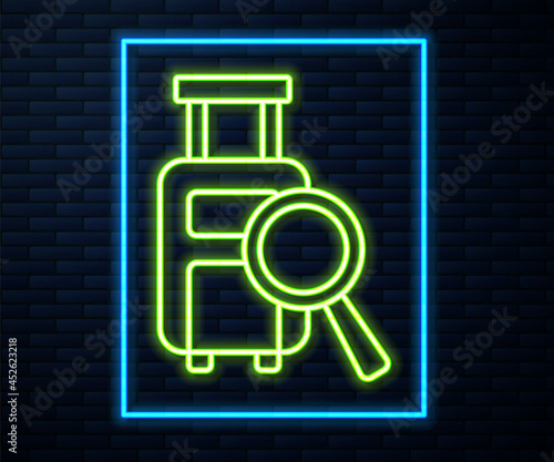 Glowing neon line Airline service of finding lost baggage icon isolated on brick wall background. Search luggage. Vector
