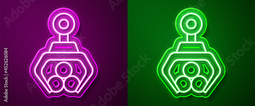 Glowing neon line Grapple crane grabbed a log icon isolated on purple and green background. Forest industry. Industrial crane for lumber trunk wood production. Vector