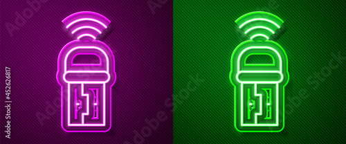 Glowing neon line Usb wireless adapter icon isolated on purple and green background. Vector