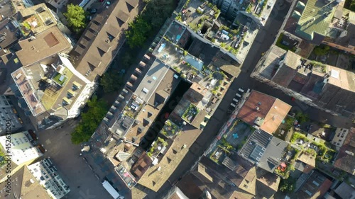 Birds Eye Aerial View Flying Above Predigerkirche Church in Zurich's Famous Old Town photo