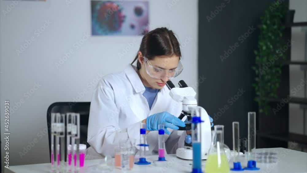 Medical scientist providing laboratory tests in search of coronavirus cure Medical scientist providing laboratory tests in search of coronavirus cure