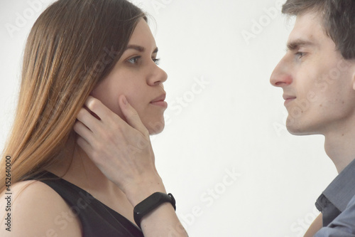 Hansome man touching face of wife