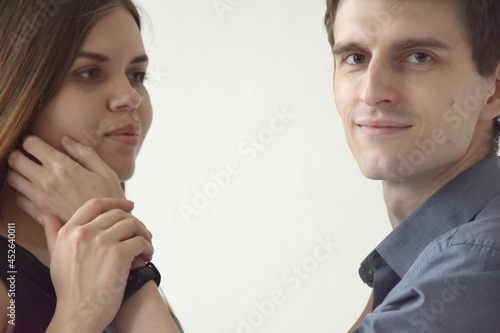 Hansome man touching face of wife